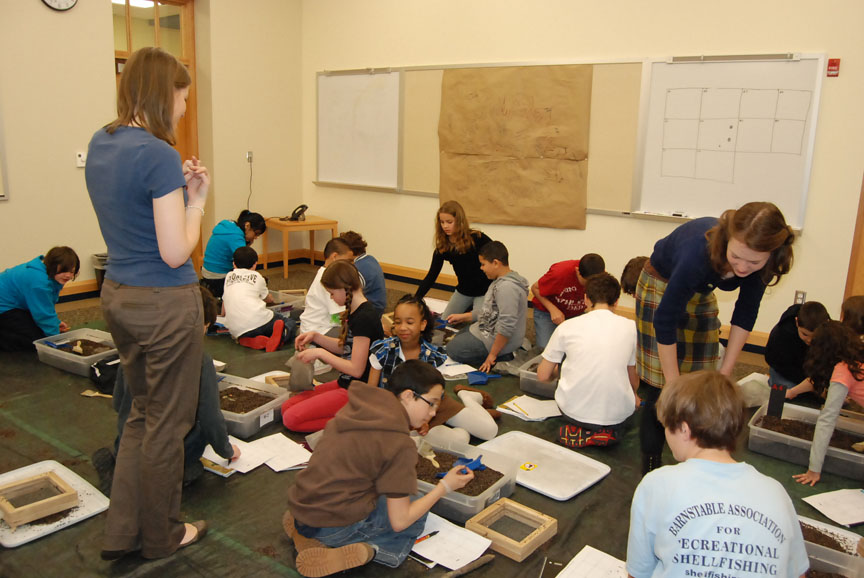 Getting their hands dirty: Middle schoolers sift through sand and dirt, looking for clues, trying to understand what the artifacts might mean. What they’re learning is how to think like an archaeologist. Getting their hands dirty: Middle schoolers sift through sand and dirt, looking for clues, trying to understand what the artifacts might mean. What they’re learning is how to think like an archaeologist.