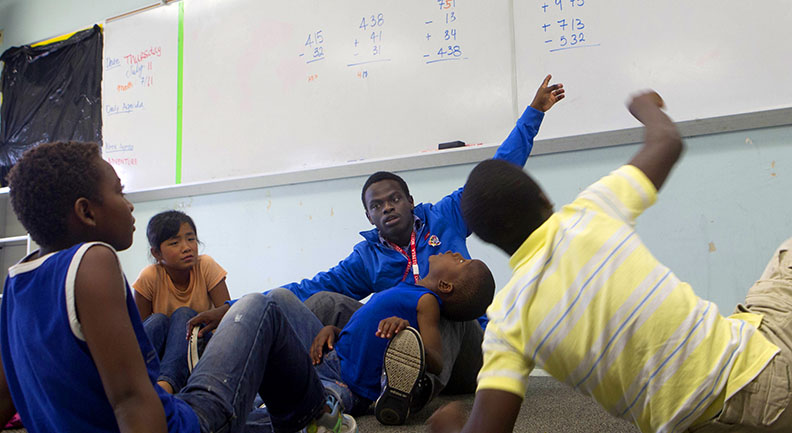 A chance to give back: Jean-Jacques Yves Sibomana, a Brown senior, arrived in the United States as a refugee from Rwanda. Many of the counselors have faced what their young charges are facing now. A chance to give back: Jean-Jacques Yves Sibomana, a Brown senior, arrived in the United States as a refugee from Rwanda. Many of the counselors have faced what their young charges are facing now.