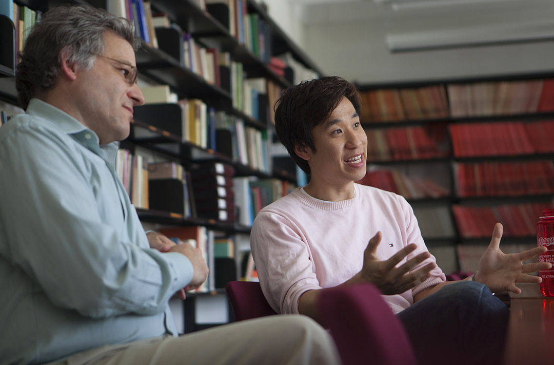 The search for a heavy top-like quark: Michael Luk, right, with adviser Ulrich Heintz: “By not finding evidence for the T-quark, we are setting restrictions on an entire class of new theories and influencing this entire field of research.” Credit:&nbsp;Mike&nbsp;Cohea/Brown&nbsp;University