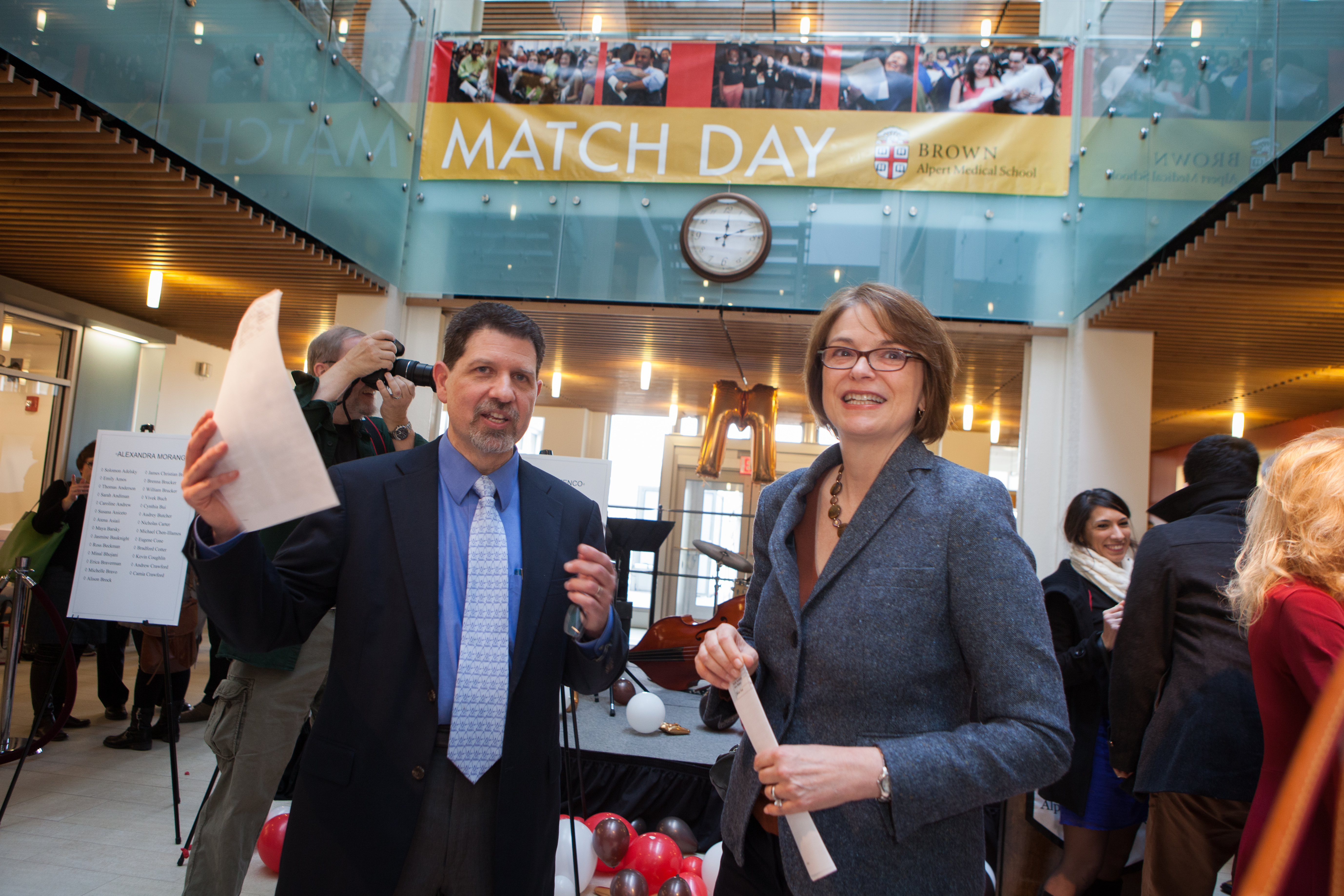 Congratulations: President Christina Paxson, with Associate Dean Phil Grappuso, personally congratulated the M.D. Class of 2013 at her first Alpert Medical School Match Day. Congratulations: President Christina Paxson, with Associate Dean Phil Grappuso, personally congratulated the M.D. Class of 2013 at her first Alpert Medical School Match Day.
