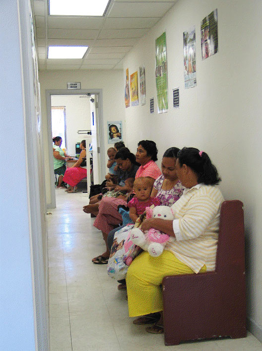 Check-up at the well baby clinic, American Samoa: The average weight gain curve of Samoan babies is similar to babies that are nutritionally deprived in the womb but then compensate by gaining weight rapidly after birth. Samoan babies are not undernourished. Credit: Kelley Smith Check-up at the well baby clinic, American Samoa: The average weight gain curve of Samoan babies is similar to babies that are nutritionally deprived in the womb but then compensate by gaining weight rapidly after birth. Samoan babies are not undernourished. Credit: Kelley Smith
