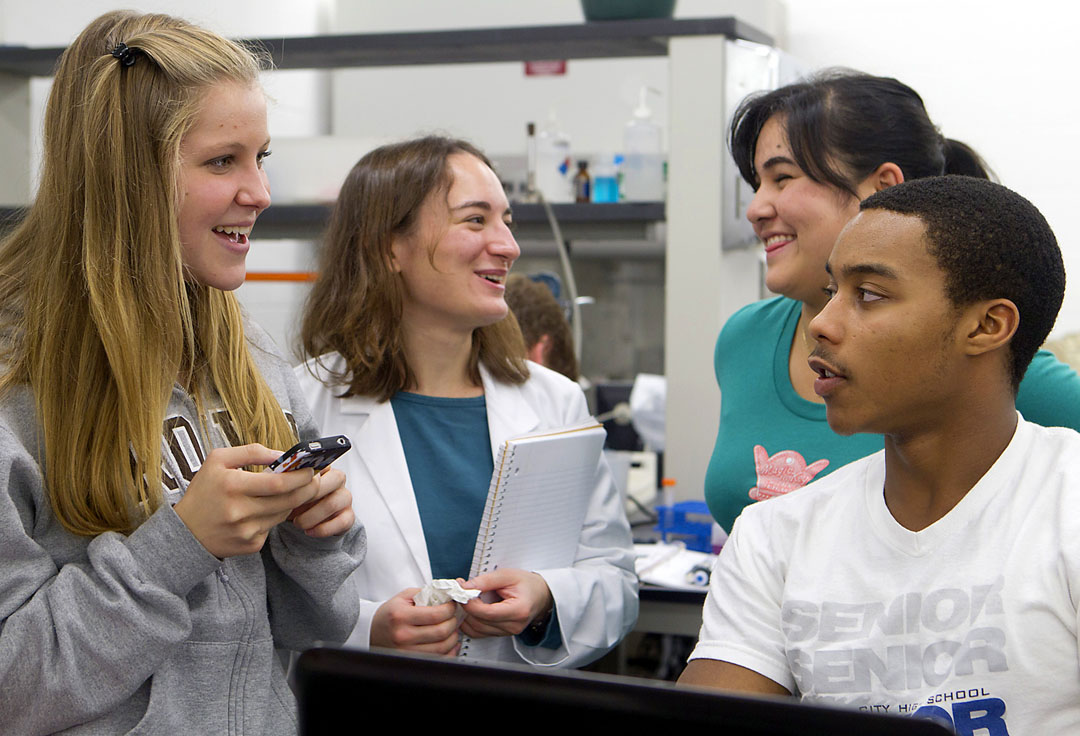 Hard work and viral Olympics: Lab partners Tina Voelcker and Anthony Cox, foreground, work on their virus Antina. Selen Senocak (Artemis) and Aisha Ferrazares (Virgil), rear, work on theirs. The winning virus gets a full sequencing between semesters. Hard work and viral Olympics: Lab partners Tina Voelcker and Anthony Cox, foreground, work on their virus Antina. Selen Senocak (Artemis) and Aisha Ferrazares (Virgil), rear, work on theirs. The winning virus gets a full sequencing between semesters.