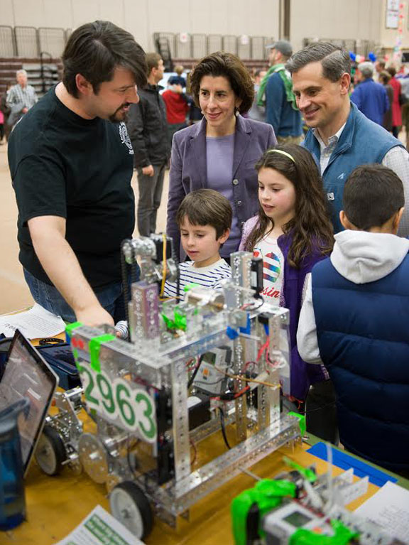 Coming soon to homes and schools near you: State Treasurer Gina Raimondo and family look at the inner workings of a robot. “Not everybody is going to be a roboticist,” says Brown’s Chad Jenkins, “but as these technologies develop, we’ll all be using them.” Coming soon to homes and schools near you: State Treasurer Gina Raimondo and family look at the inner workings of a robot. “Not everybody is going to be a roboticist,” says Brown’s Chad Jenkins, “but as these technologies develop, we’ll all be using them.”