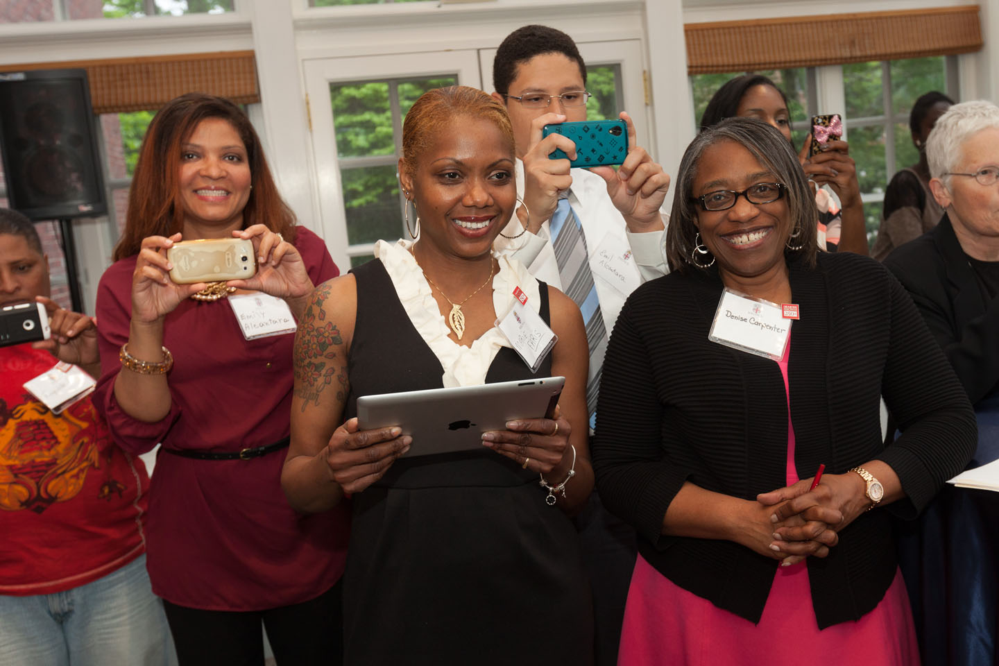 Celebrating achievement and potential: Smart phones, cameras, and large smiles were everywhere at the celebration of success in the classroom and in life.