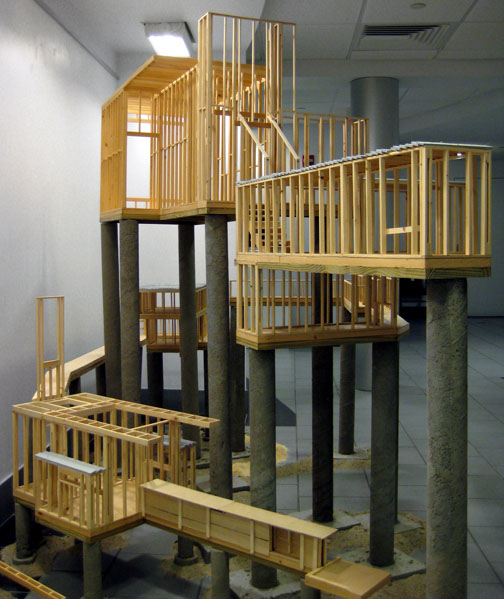 Jon Laustsen, The Reachers and Dwellers, v2: Reinforced concrete, lumber, steel, sand, stone, sawdust, and paint; 6 x 15 x 5 feet (2009) Jon Laustsen, The Reachers and Dwellers, v2: Reinforced concrete, lumber, steel, sand, stone, sawdust, and paint; 6 x 15 x 5 feet (2009)