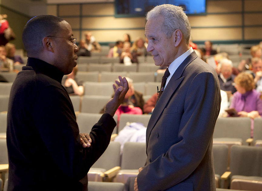 Discrimination in health care is unethical, inhumane: White speaks with Gary Johnson, clinical associate professor of neurology, prior to his address. Credit: Mike Cohea/Brown University Discrimination in health care is unethical, inhumane: White speaks with Gary Johnson, clinical associate professor of neurology, prior to his address. Credit: Mike Cohea/Brown University
