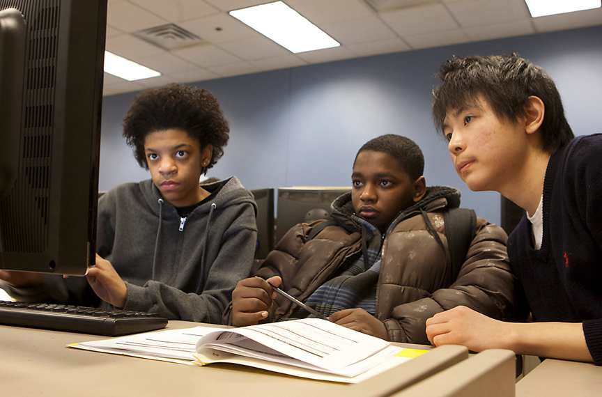 Focused on programming, unfazed by algebra: Kidai Kwon, right, works with middle-school students Devante King, left, and Wesley Cabral during an after-school Bootstrap session. Credit: Mike Cohea Focused on programming, unfazed by algebra: Kidai Kwon, right, works with middle-school students Devante King, left, and Wesley Cabral during an after-school Bootstrap session. Credit: Mike Cohea