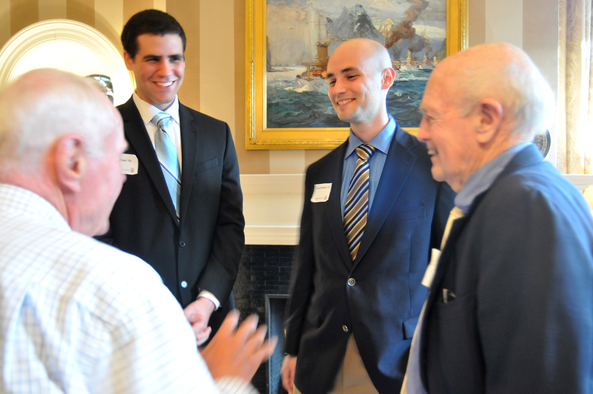Common ground: Bill Meyer and Bill Monroe of the Class of 1950, foreground, traded military stories with Philip Crean ’14, David Salsone’13 at the Hope Club Thursday night. Credit: Frank Mullin/Brown University Common ground: Bill Meyer and Bill Monroe of the Class of 1950, foreground, traded military stories with Philip Crean ’14, David Salsone’13 at the Hope Club Thursday night. Credit: Frank Mullin/Brown University